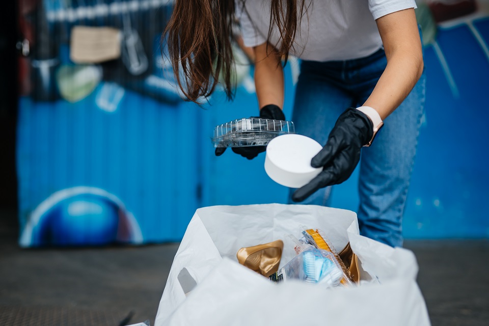 young-woman-sorting-garbage-concept-recycling-zero-waste.jpg